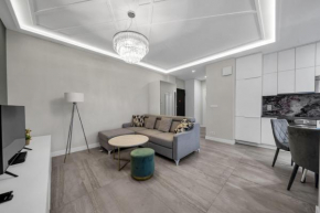 Wola Apartment - 9th Floor, Parking & Balcony - by Rentujemy